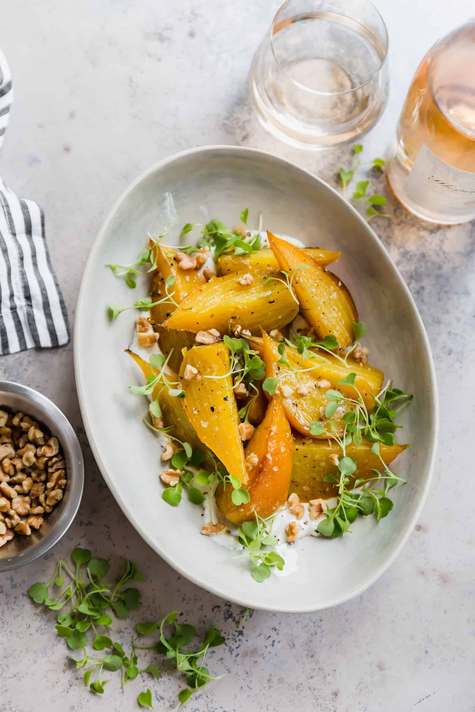 Roasted golden beets on horseradish cream with arugula and walnuts
