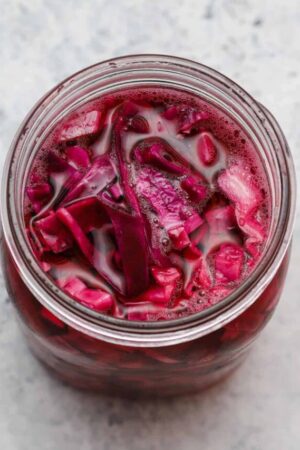 Pickled red cabbage in a mason jar.