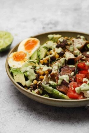 Mexican Cobb salad with grilled chicken in a bowl.