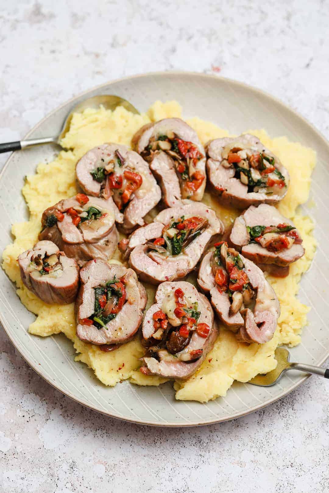 Juicy Cheese-Stuffed Pork Tenderloin with Roasted Peppers