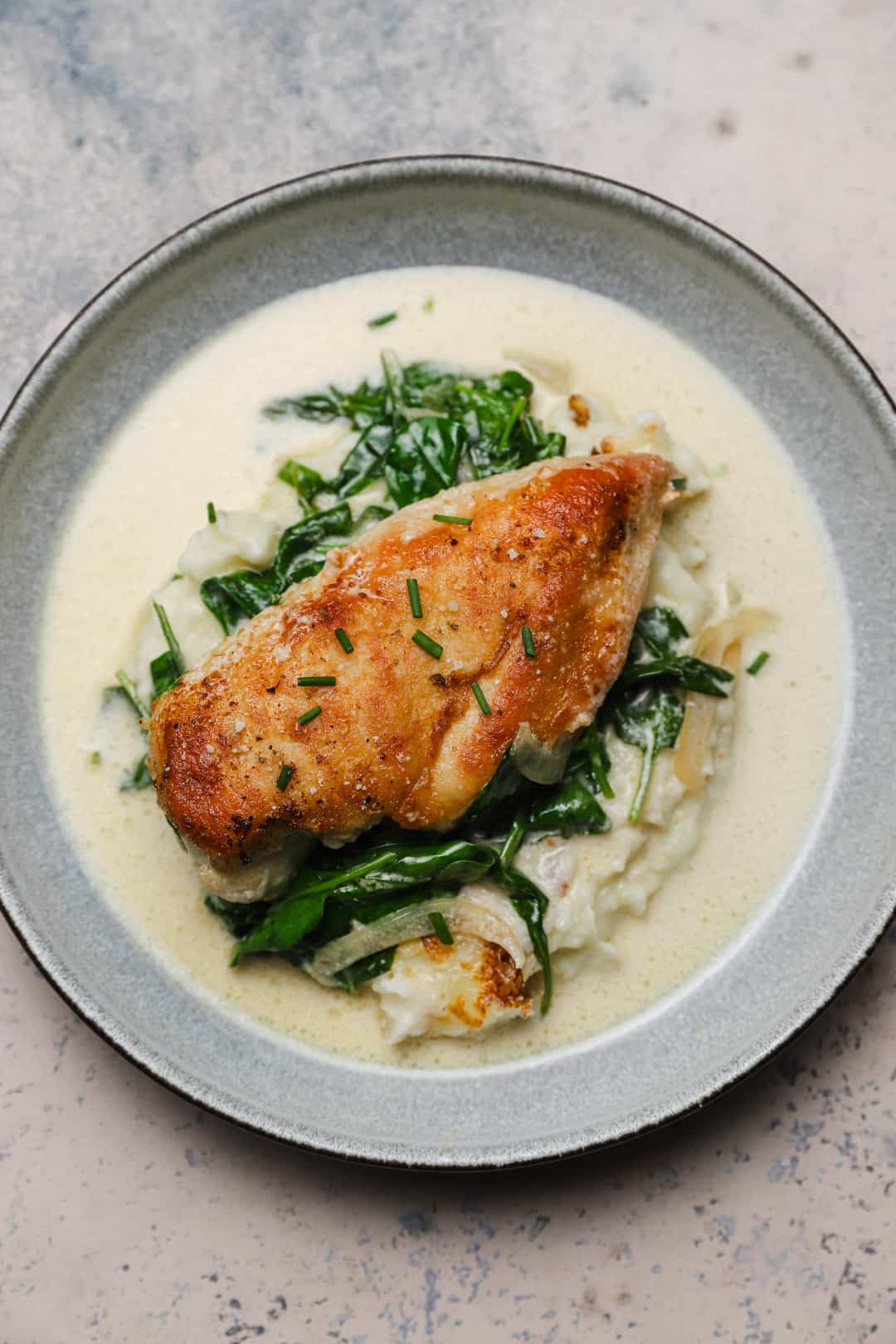 Skillet chicken with spinach and mashed potatoes