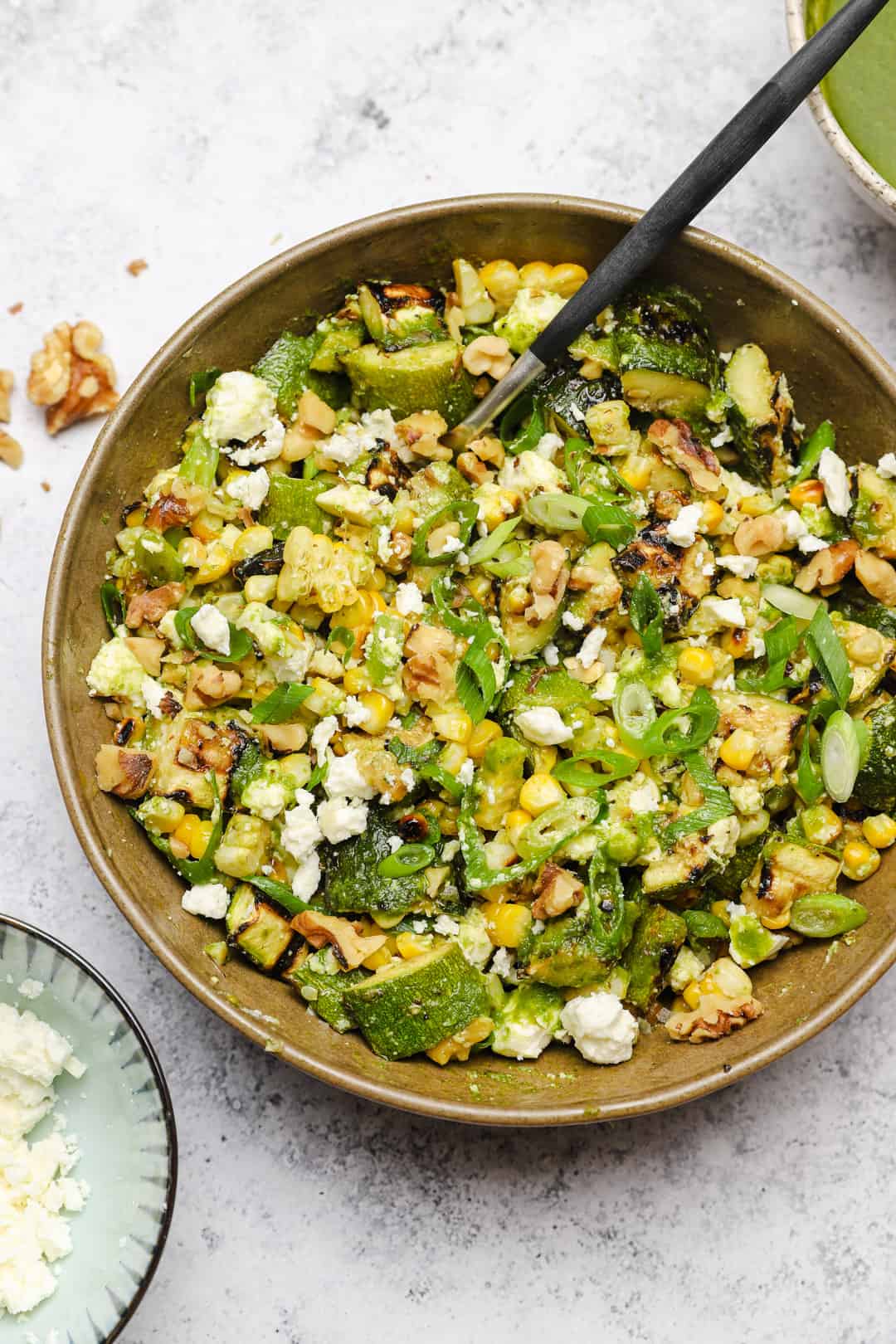 Grilled corn and zucchini salad with basil vinaigrette, walnuts and feta
