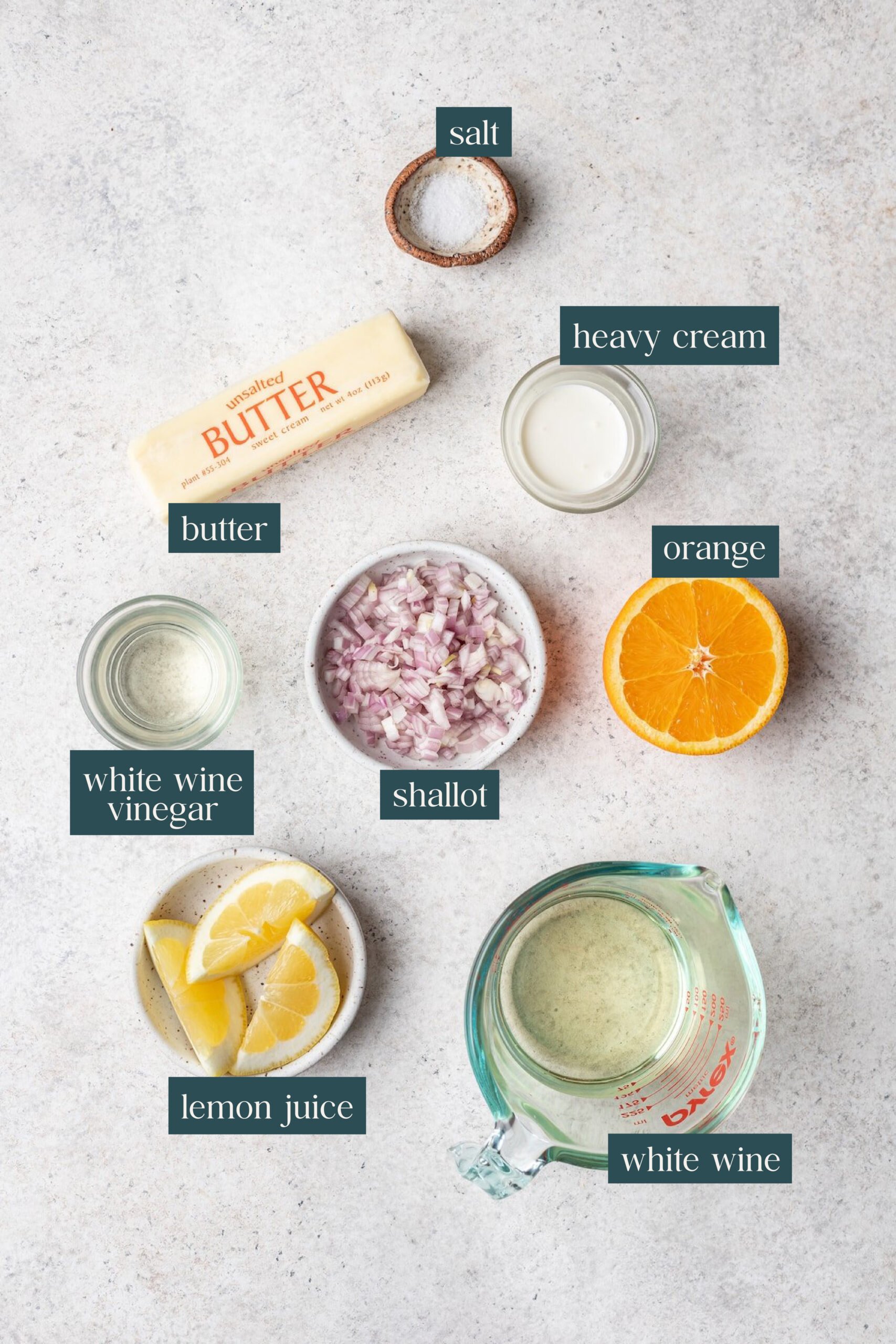 Labeled ingredients for fresh citrus beurre blanc sauce.