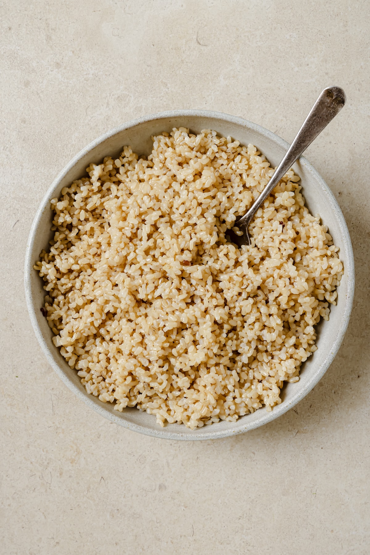 Bowl of cooked brown rice.
