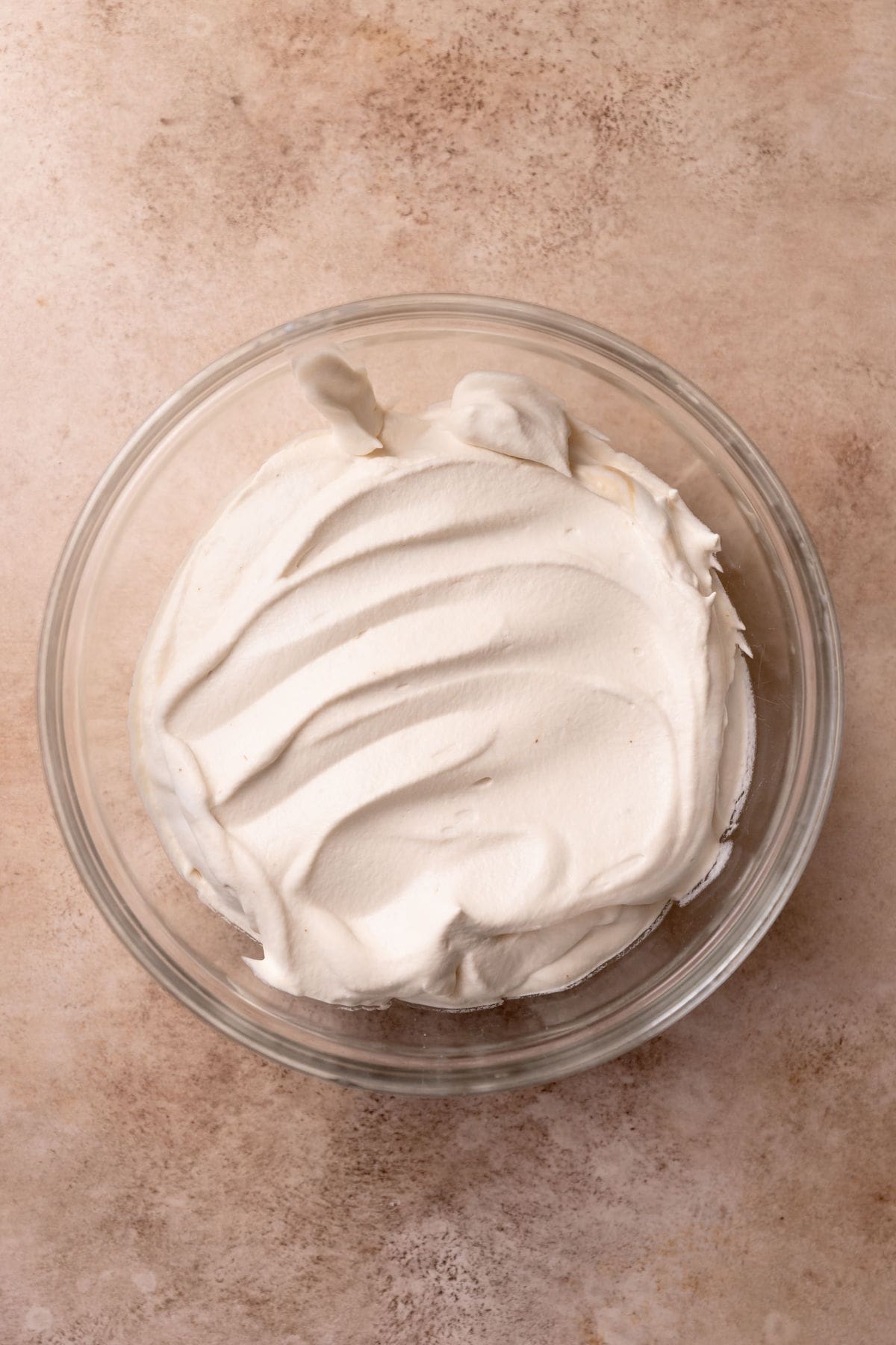 Homemade whipped cream in a bowl.