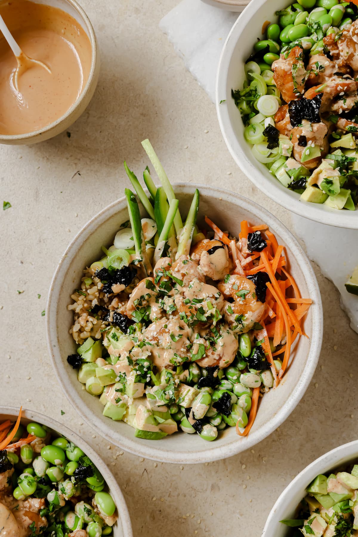 Shrimp bowls with rice and spicy mayo.