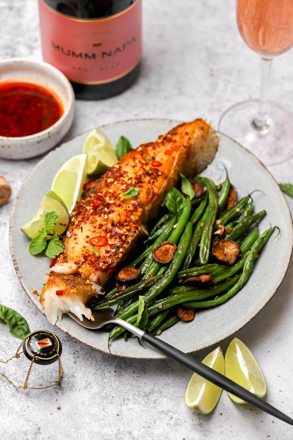 Chili garlic oil on top of pan seared halibut steaks.