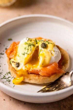 Smoked salmon on English muffins with poached eggs and hollandaise.