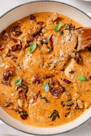 Marry me chicken with sun dried tomatoes in a large pot.