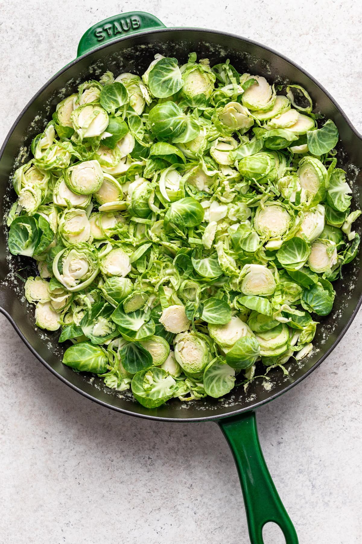 Add Brussels sprouts to a cast iron skillet.