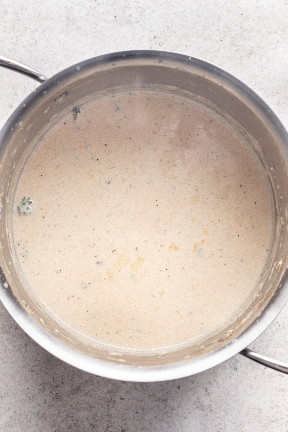 Add fresh thyme, garlic, and cheese.