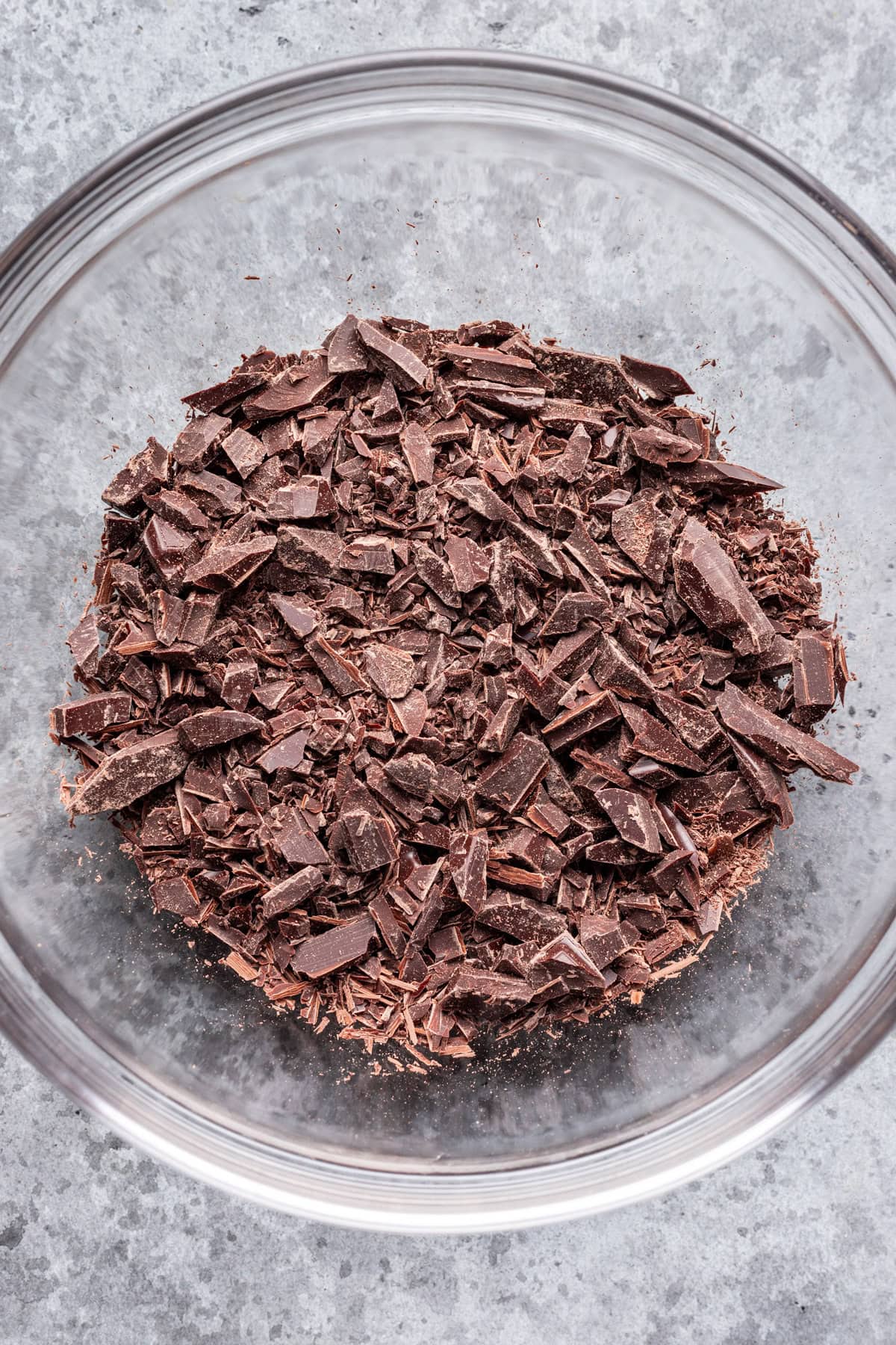 Chopped chocolate in a bowl.
