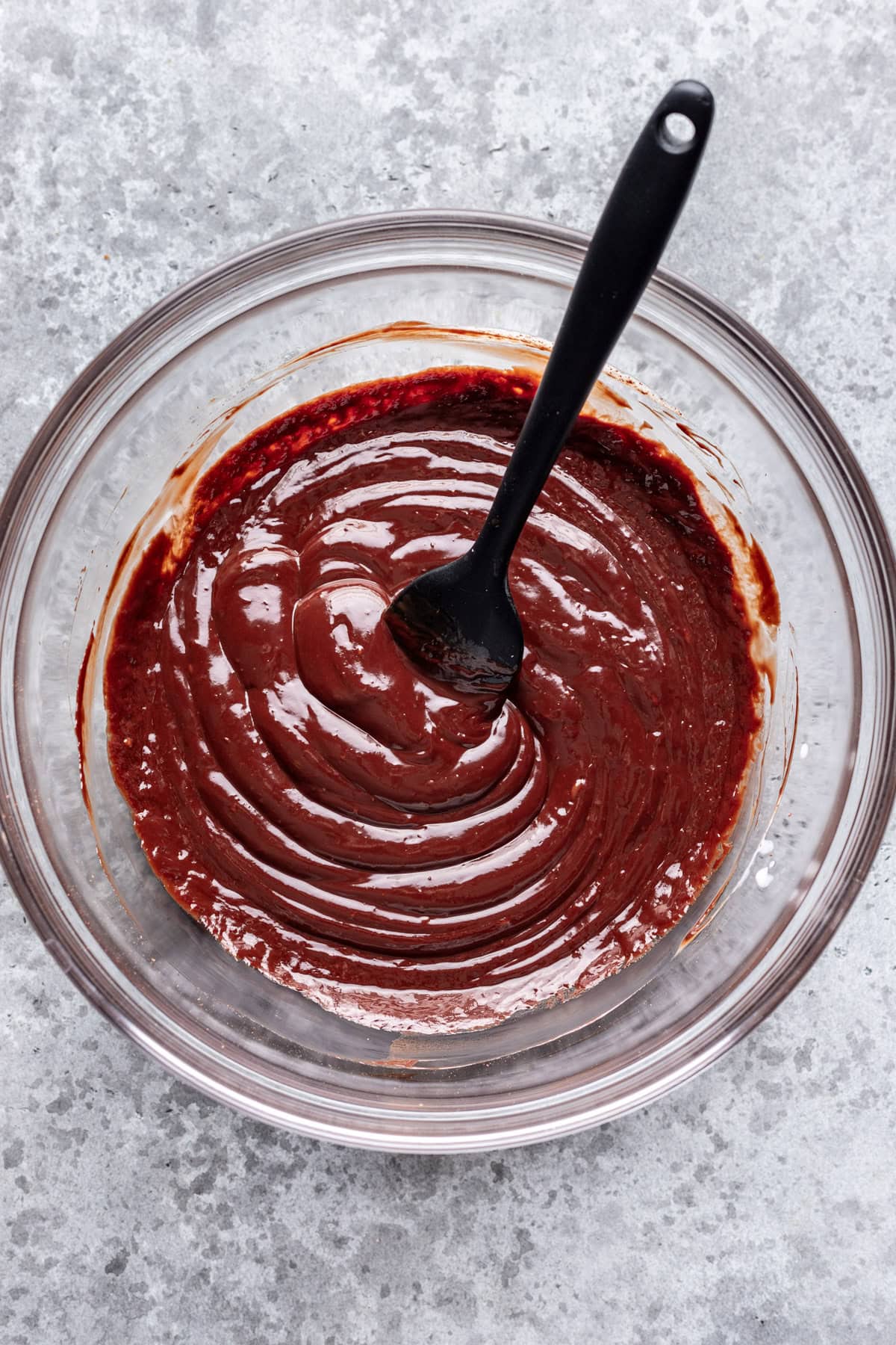 Homemade chocolate ganache in a mixing bowl.