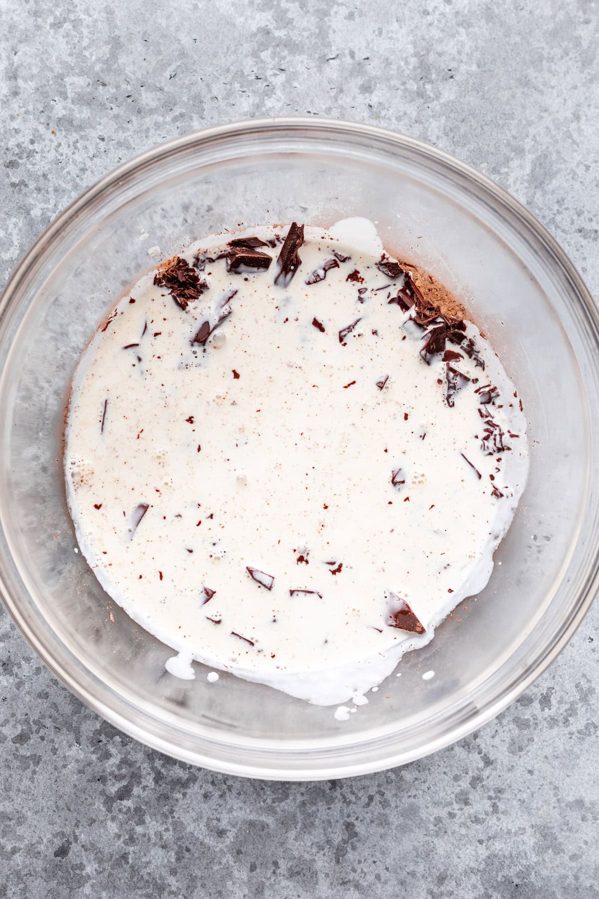 Warm heavy cream on top of chocolate to make ganache.