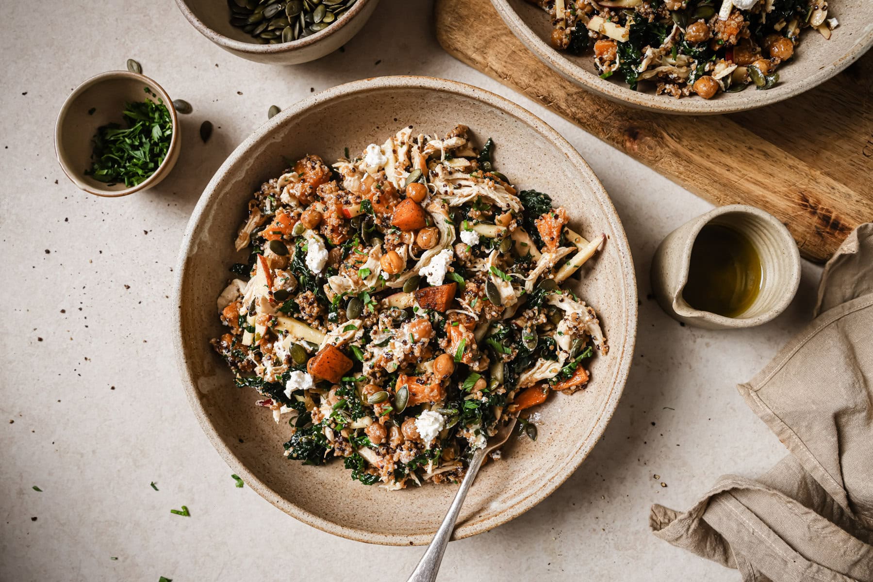 Qunioa bowls with honey mustard vinaigrette and rotisserie chicken.