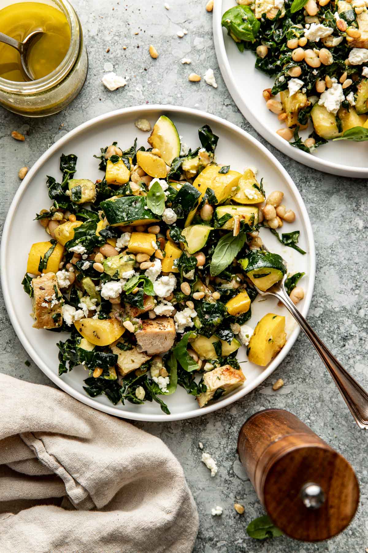 Kale salad with grilled chicken and vegetables.