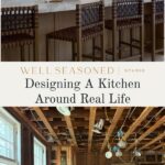 A modern kitchen with gray cabinets and a marble backsplash above, and a stripped-down kitchen under renovation below, with exposed wooden beams and wiring. Text reads: Well Seasoned | Studio. Designing a kitchen around real life for everyday living.