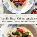 Two blue and white bowls filled with fresh strawberries, blueberries, and raspberries topped with creamy vanilla bean crème anglaise sauce, garnished with mint leaves. A spoon rests in one of the bowls.